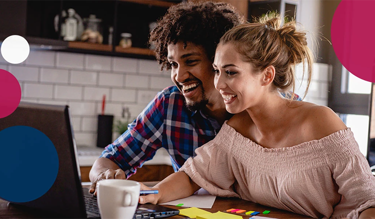 Couple looking at laptop