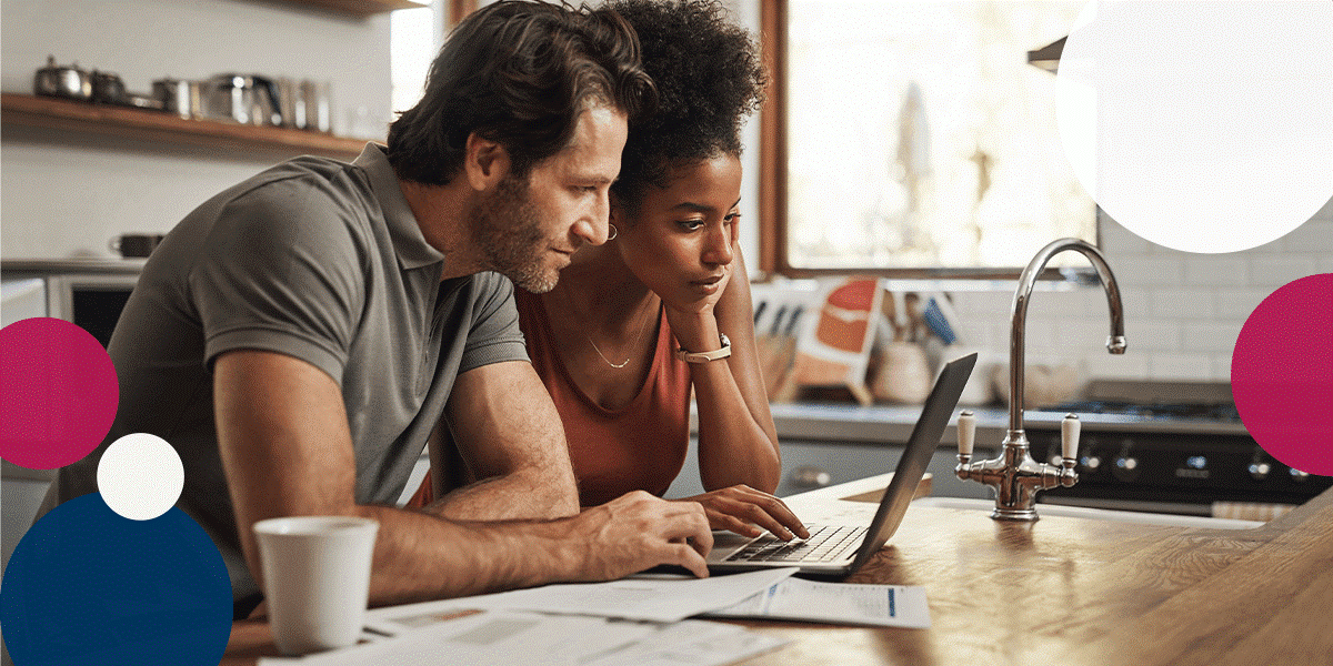 Couple Working On Laptop